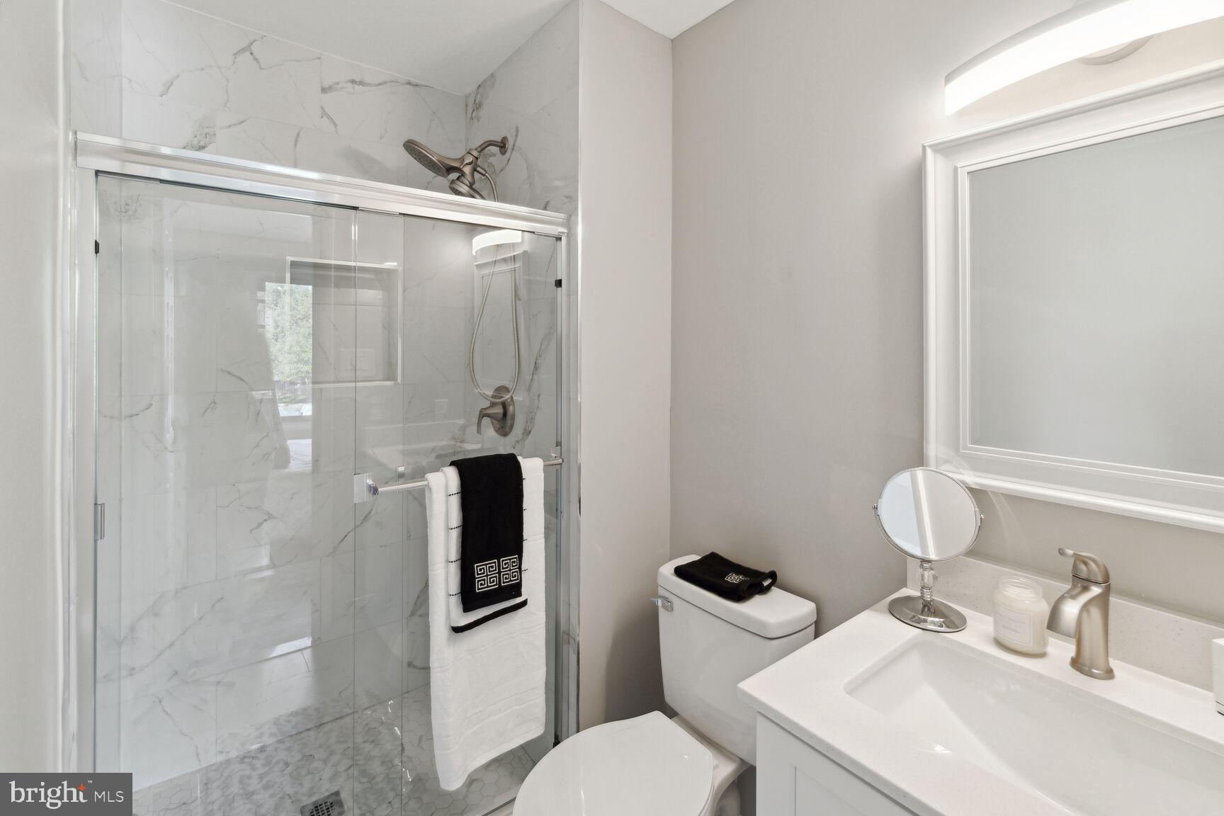 3115 Apple Road Northeast, Unit 2 Washington, DC 20018 - Photo 14 of 27 Primary Bedroom Bathroom
