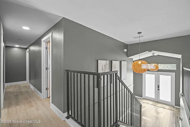 a view of staircase with rug