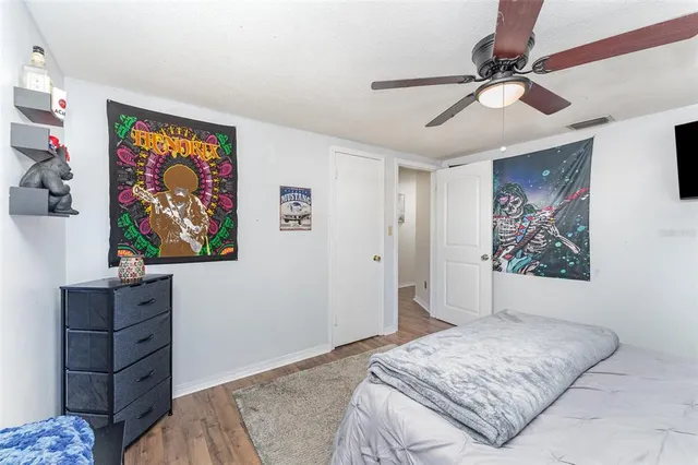 a bedroom with a bed and furniture