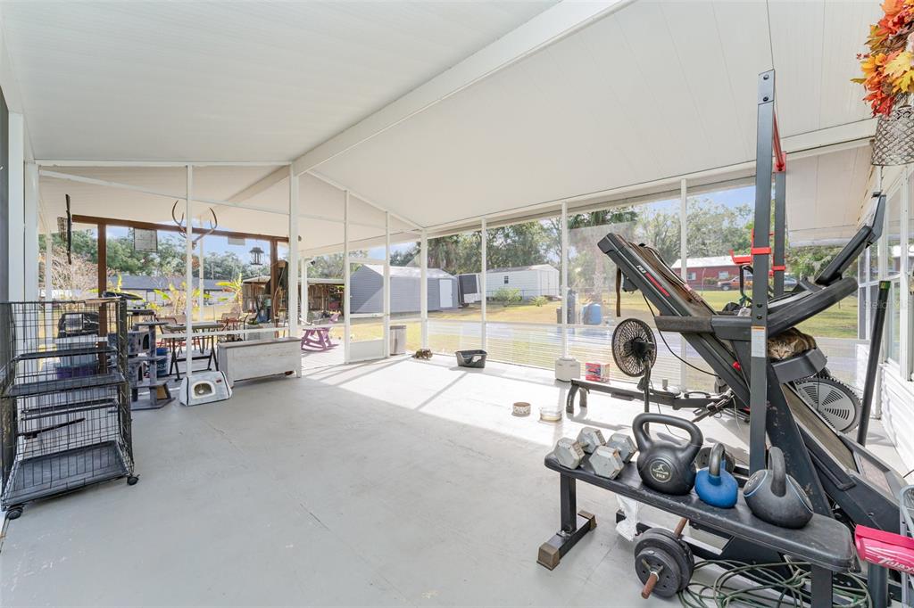4145 Willow Oak Road Mulberry, FL 33860 - Photo 25 of 30 a view of a room with gym equipment