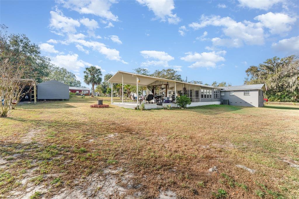 4145 Willow Oak Road Mulberry, FL 33860 - Photo 29 of 30 a view of a house with yard and sitting area