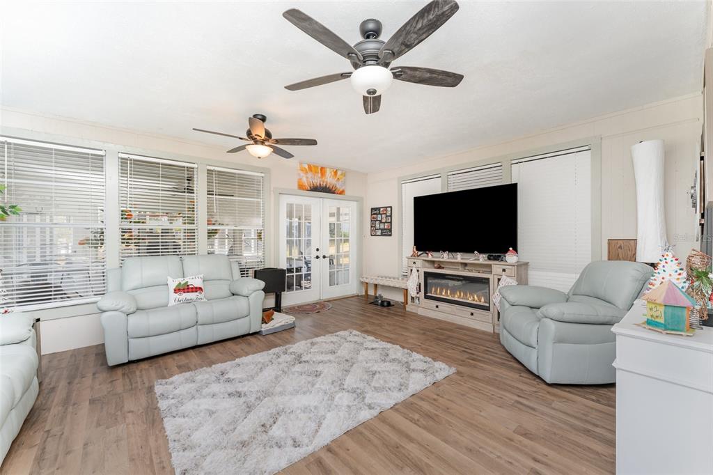 4145 Willow Oak Road Mulberry, FL 33860 - Photo 8 of 30 a living room with furniture and a flat screen tv