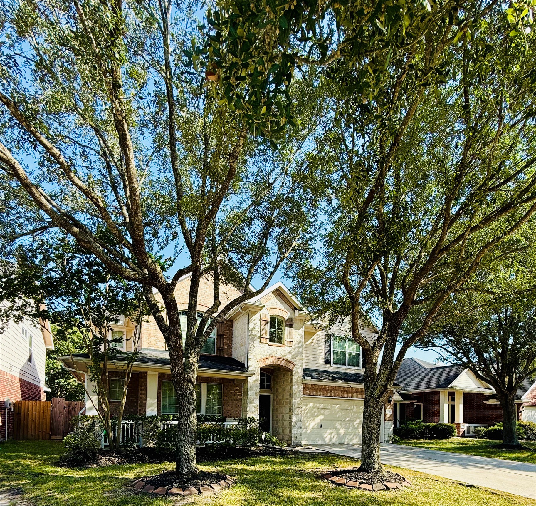 3114 Double Jack Court Spring, TX 77373 - Photo 2 of 41 a front view of a house with a garden
