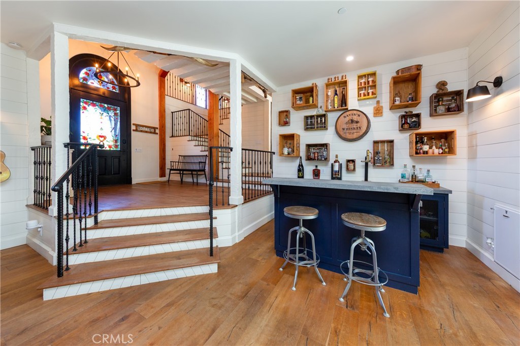 85 Saddlebow Road Bell Canyon, CA 91307 - Photo 20 of 75 a view of a room with wooden floor and furniture