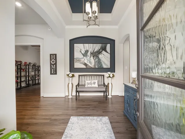 a view of entryway with wooden floor