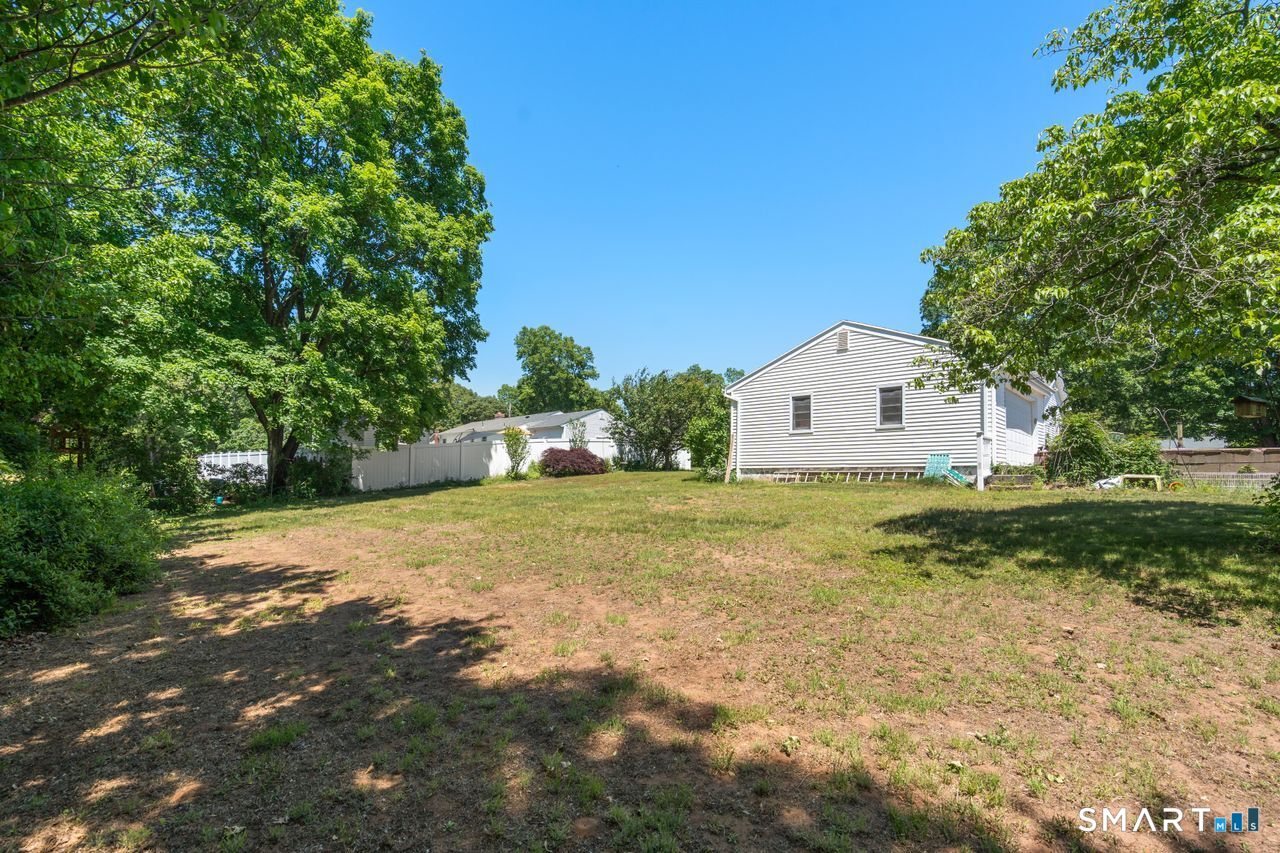 9 Stanton Road North Haven, CT 06473 - Photo 31 of 35 a house with a yard