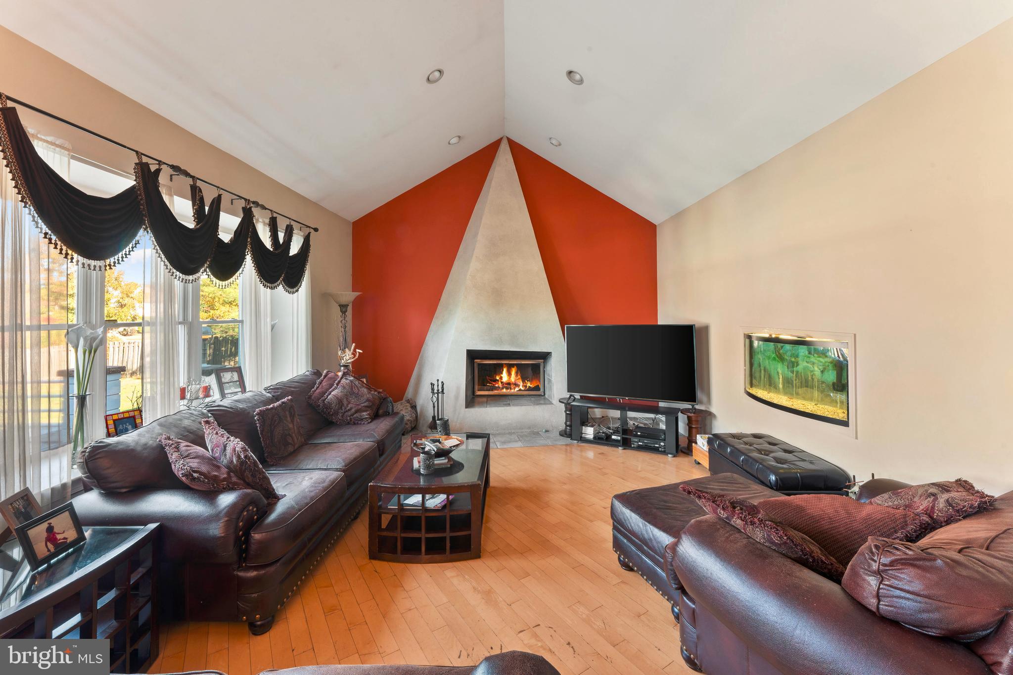 67 Lenape Road Richboro, PA 18954 - Photo 15 of 43 a living room with furniture ceiling fan and a flat screen tv