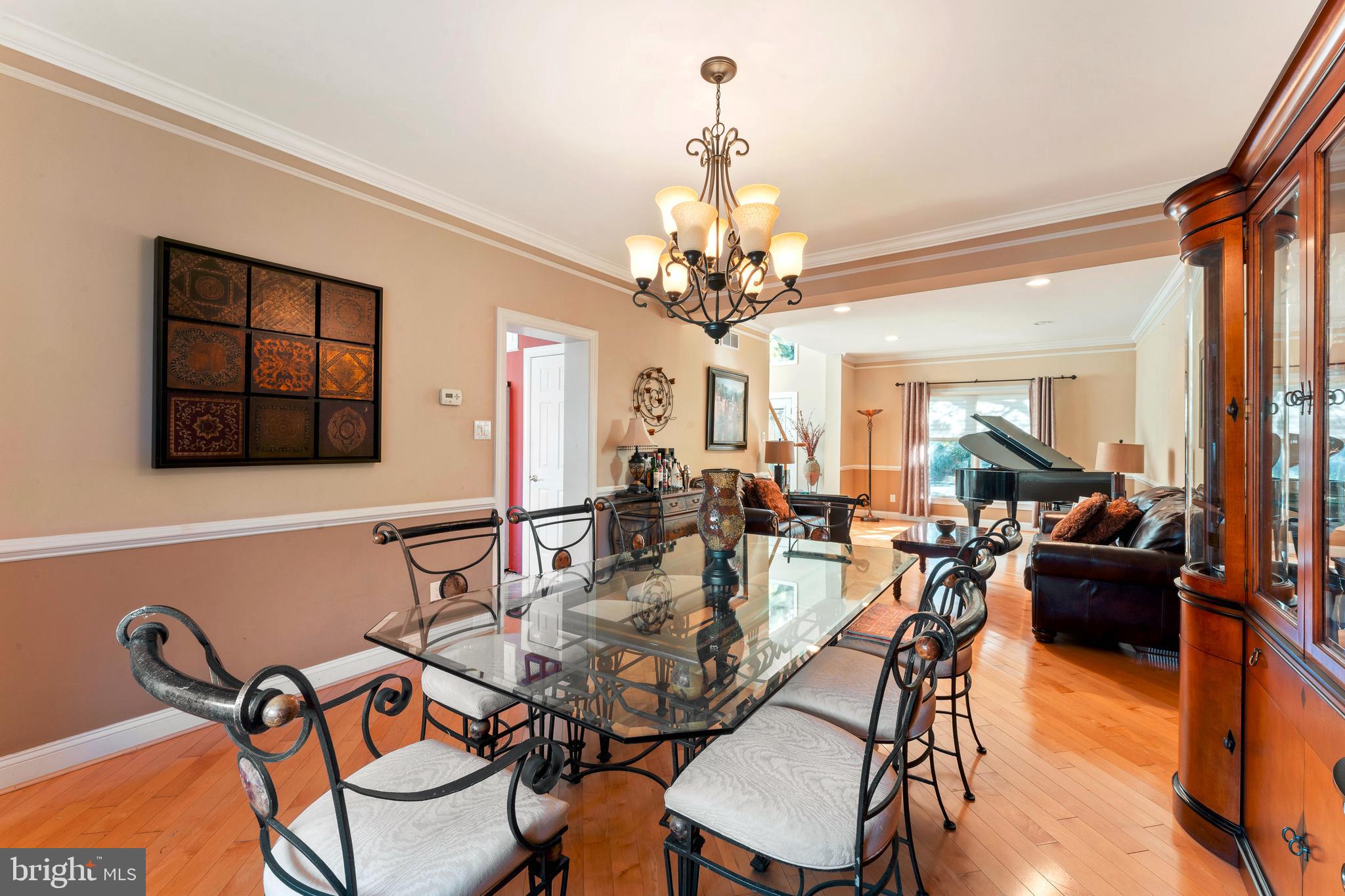 67 Lenape Road Richboro, PA 18954 - Photo 6 of 43 a view of a dining room with furniture and wooden floor