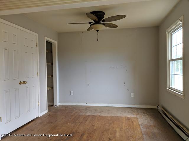 477 Pfister Road Jackson, NJ 08527 - Photo 8 of 21 a view of an empty room with a window