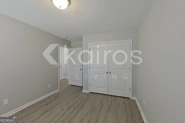 a view of entryway with wooden floor