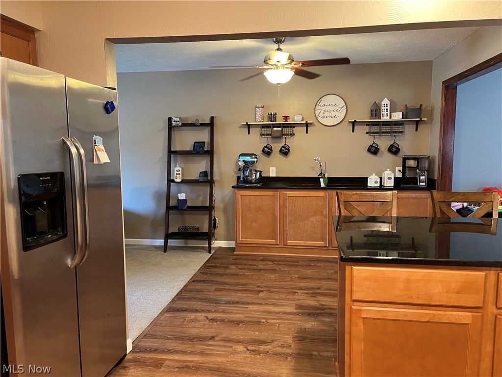 5529 Reef Road Mentor, OH 44060 - Photo 6 of 35 UPDATED KITCHEN AND DINING ROOM WITH LIFE PROOF LTV FLOORS AND BUILT IN COFFEE BAR PLUS A SNACK BAR