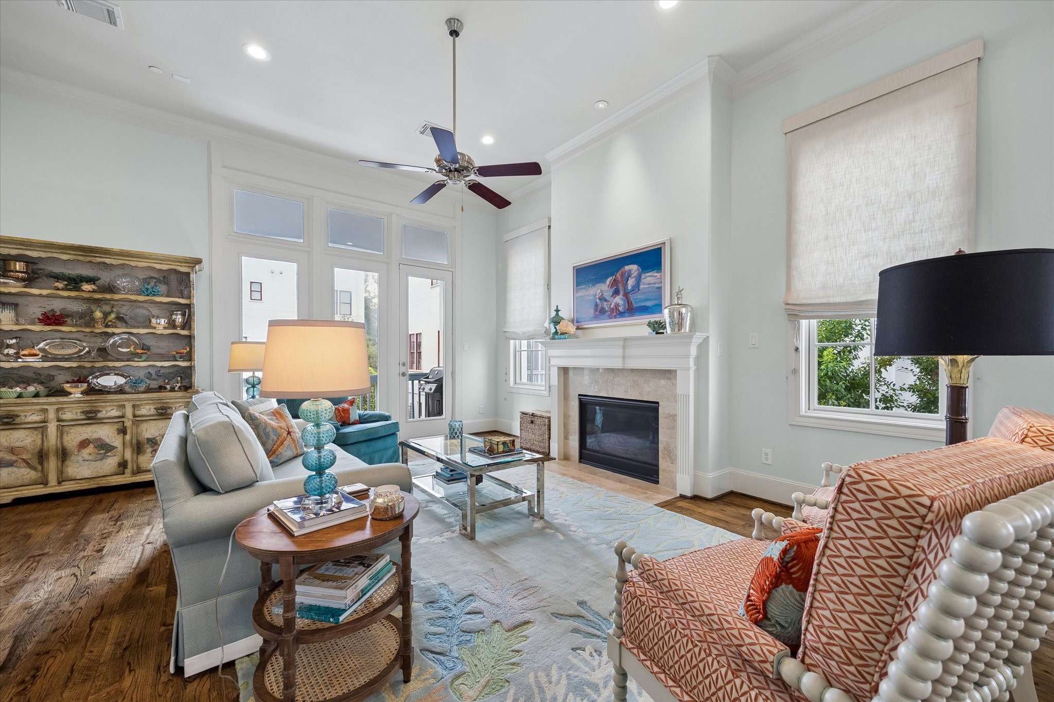 246 East 28th Street Houston, TX 77008 - Photo 7 of 27 Spacious family room with gas fireplace, powder bath, and balcony overlooking the pool