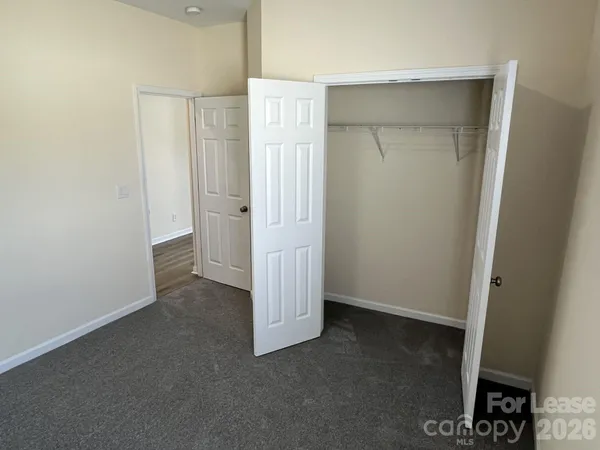 an empty room with closet