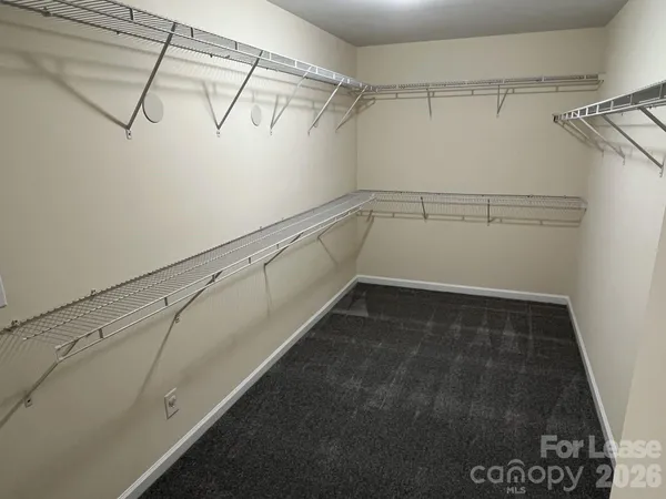 a view of a room with racks on the wall