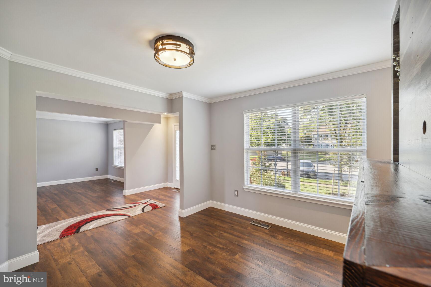 4602 Muscoti Way Bowie, MD 20720 - Photo 15 of 58 Living area view toward the foyer