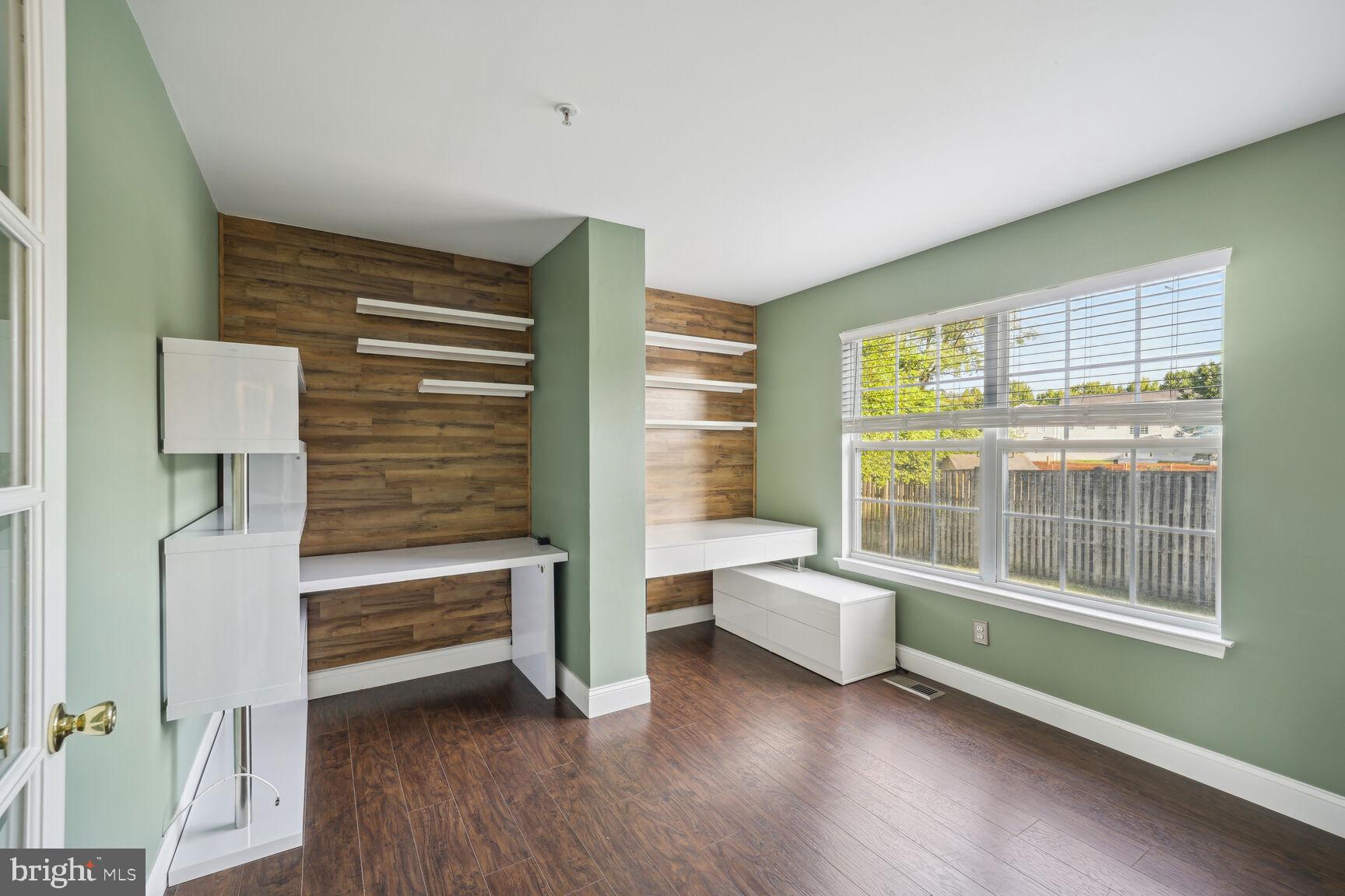 4602 Muscoti Way Bowie, MD 20720 - Photo 16 of 58 Office main level with built in desk and shelving