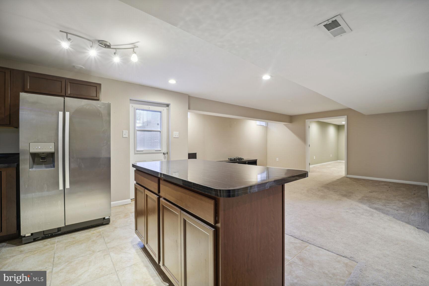 4602 Muscoti Way Bowie, MD 20720 - Photo 36 of 58 View from lower kitch to family room