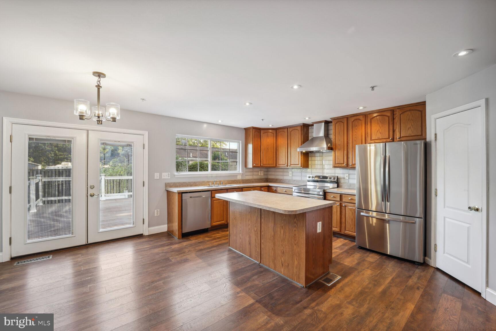 4602 Muscoti Way Bowie, MD 20720 - Photo 7 of 58 Kitchen with access to the deck