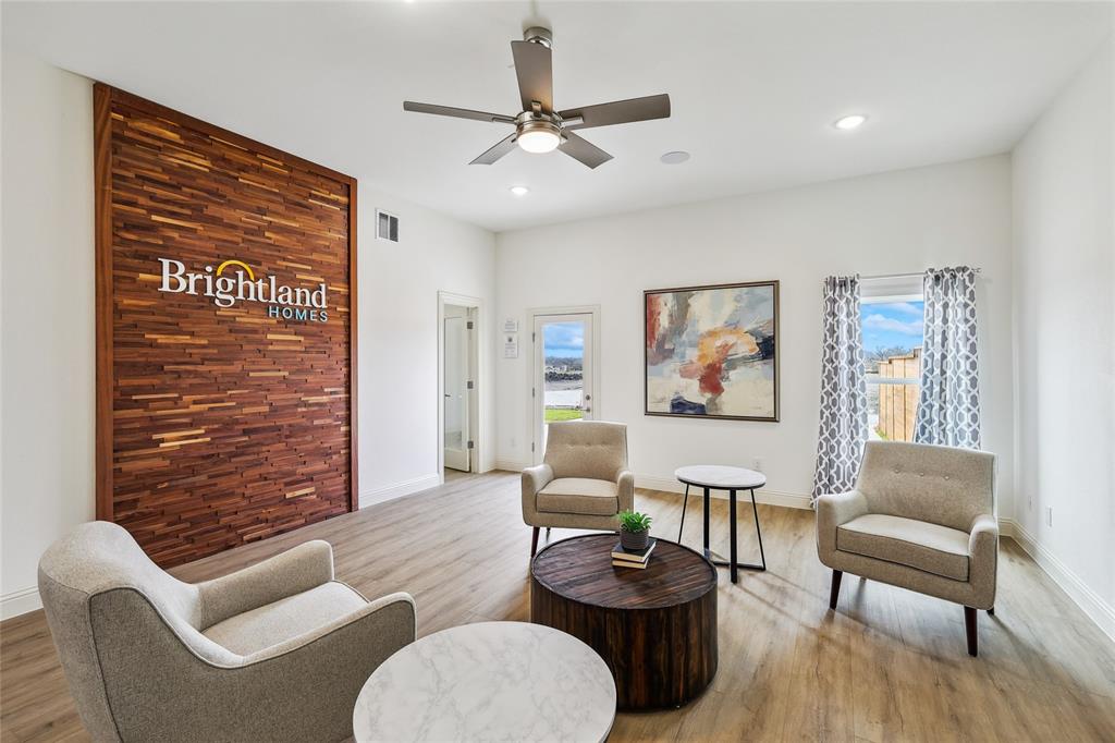 1604 Casting Ridge Mesquite, TX 75181 - Photo 35 of 38 Spacious interior room featuring a decorative wood wall, wood-finish flooring, recessed lighting, and a ceiling fan