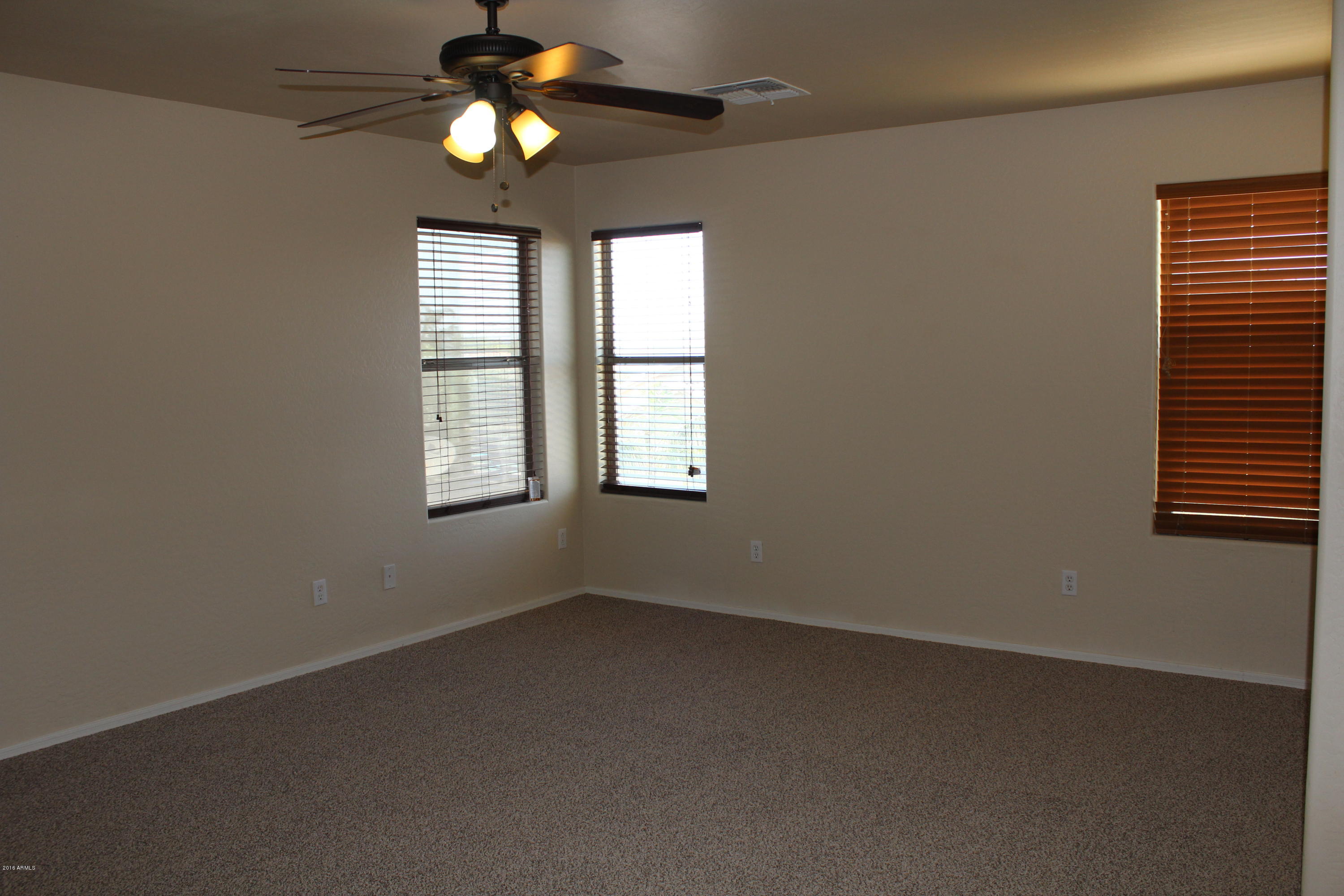 3532 West Vineyard Road Phoenix, AZ 85041 - Photo 10 of 18 Master bedroom