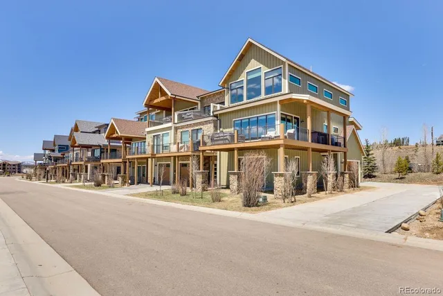 a front view of a building with a street view