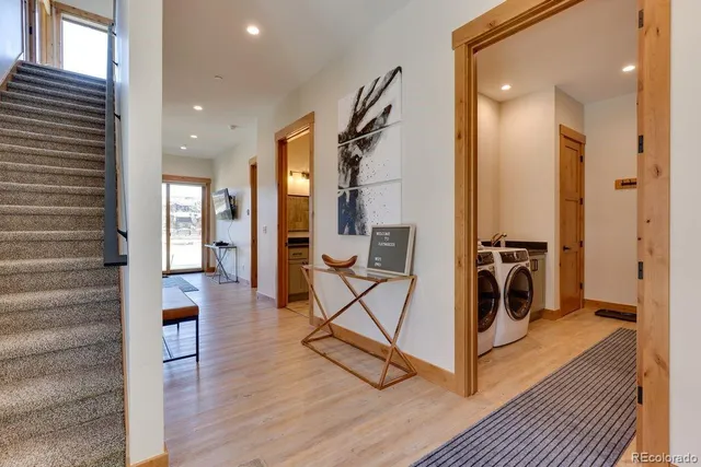 a view of a hallway with the view and living room