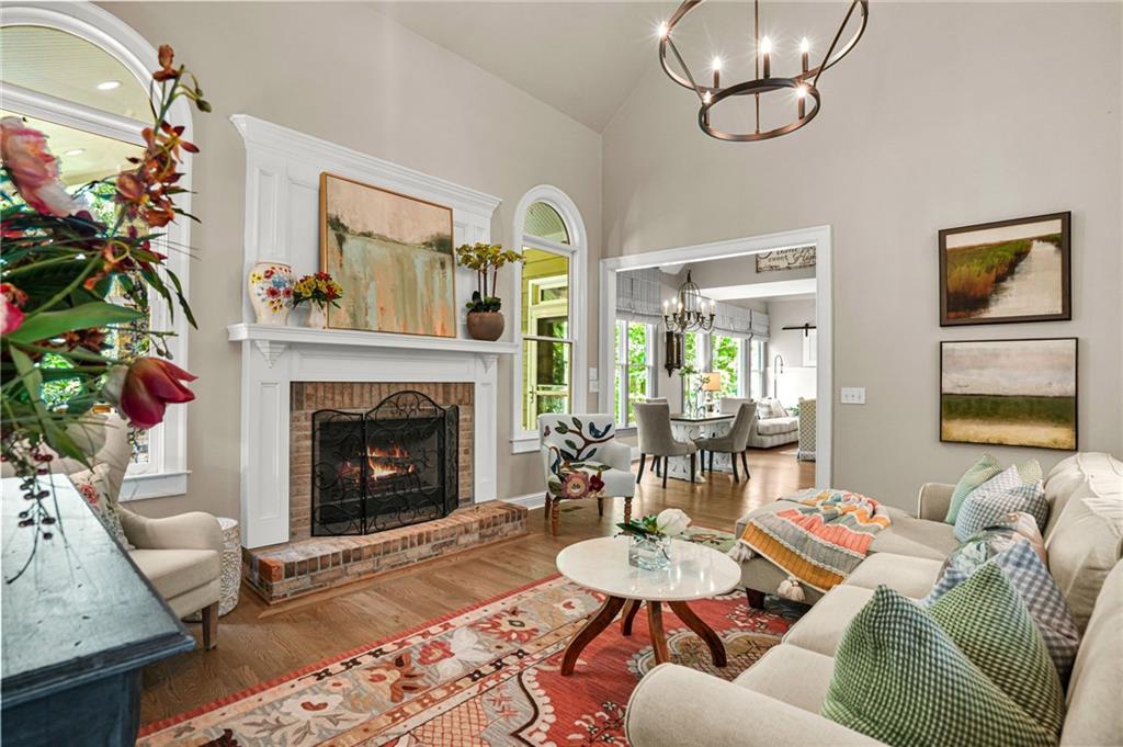 509 Crested Hawk Ridge Canton, GA 30114 - Photo 15 of 89 a living room with furniture and a fireplace