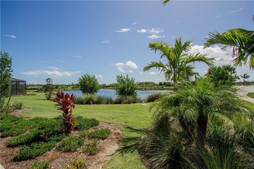 5834 Haiti Drive Naples, FL 34113 - Photo 24 of 33 a view of a garden with an outdoor space