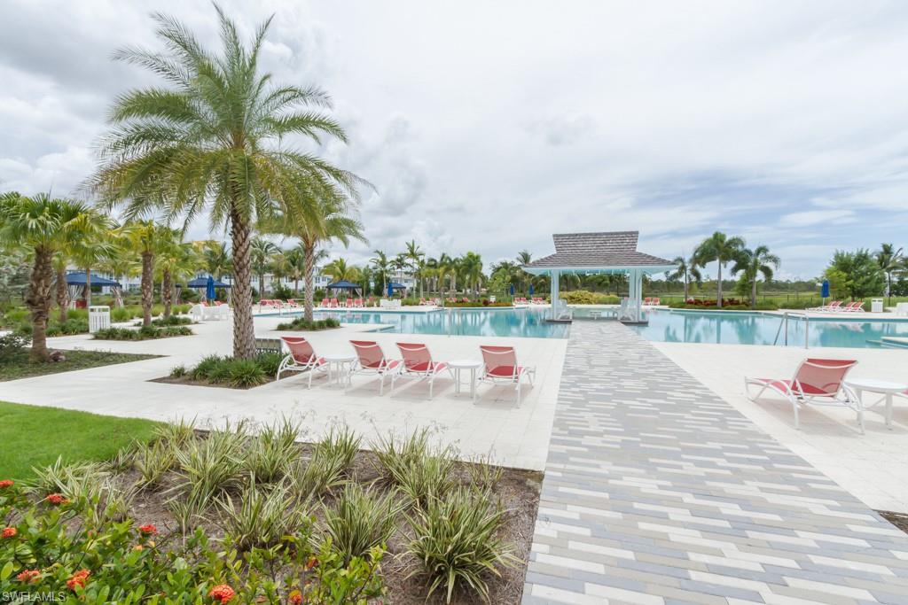 5834 Haiti Drive Naples, FL 34113 - Photo 26 of 33 a view of outdoor space with seating area