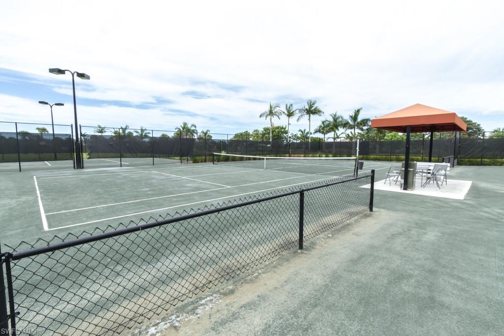 5834 Haiti Drive Naples, FL 34113 - Photo 30 of 33 a view of an outdoor space and yard