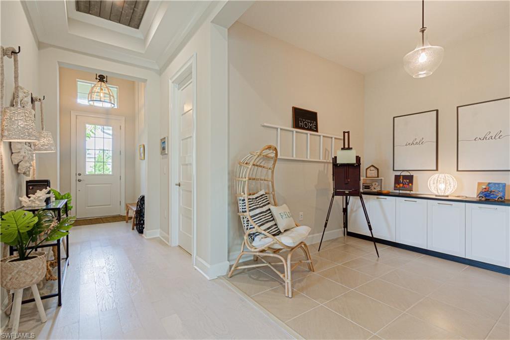 5834 Haiti Drive Naples, FL 34113 - Photo 3 of 33 a view of a kitchen with furniture and a window