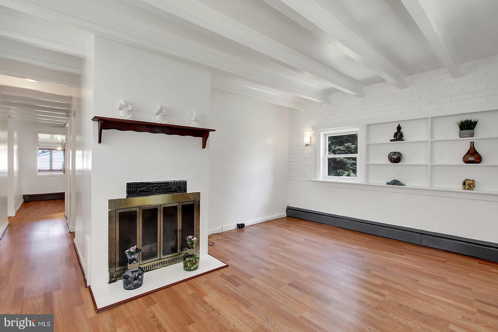 Wood burning fireplace in Living Room.
