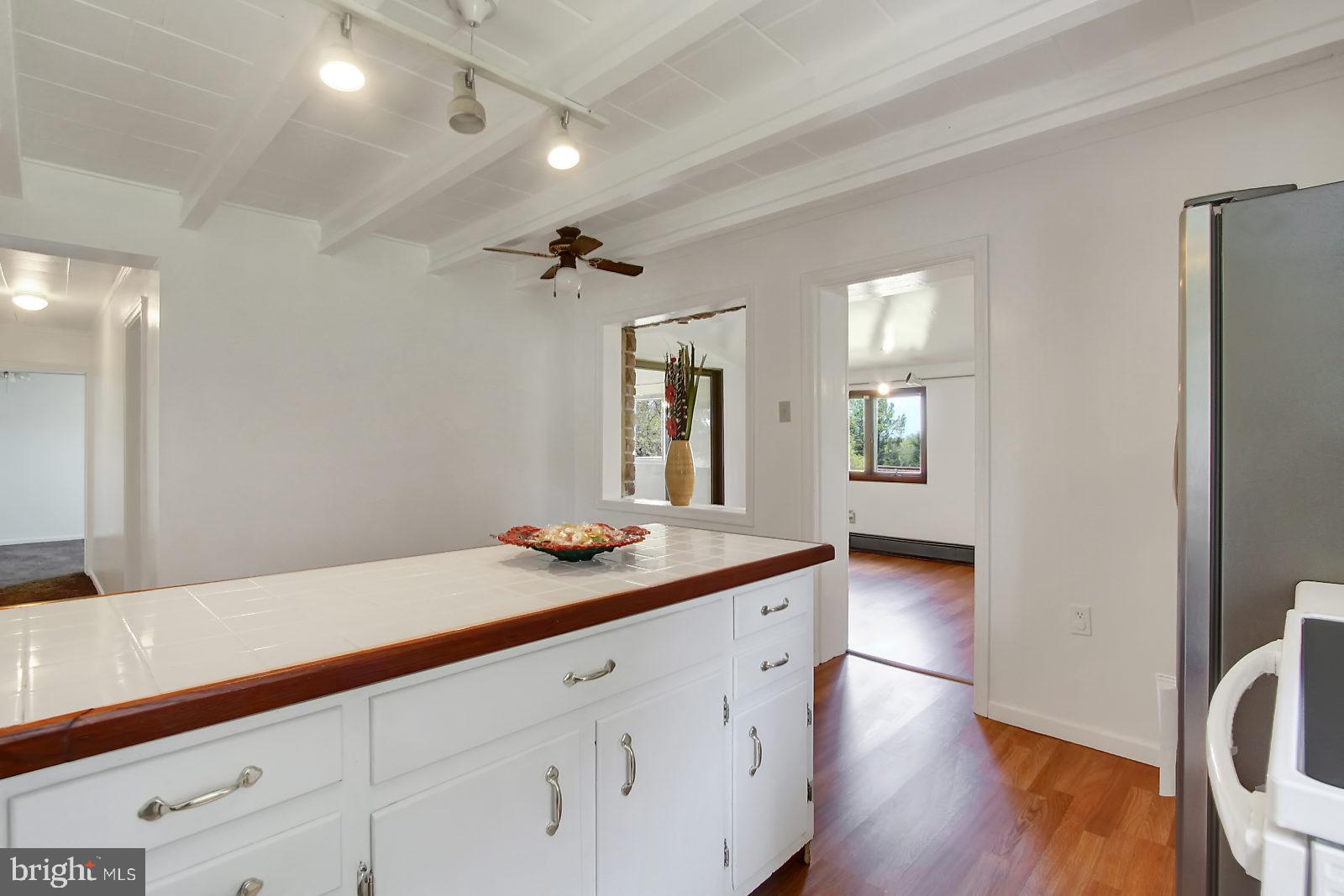 Another kitchen view. There is room for a table.