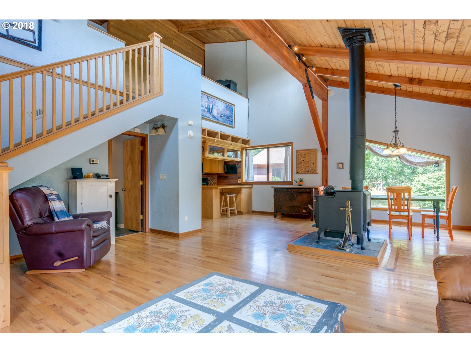 66794 Doetsch Road Deer Island, OR 97054 - Photo 12 of 32 a living room with furniture and a wooden floor