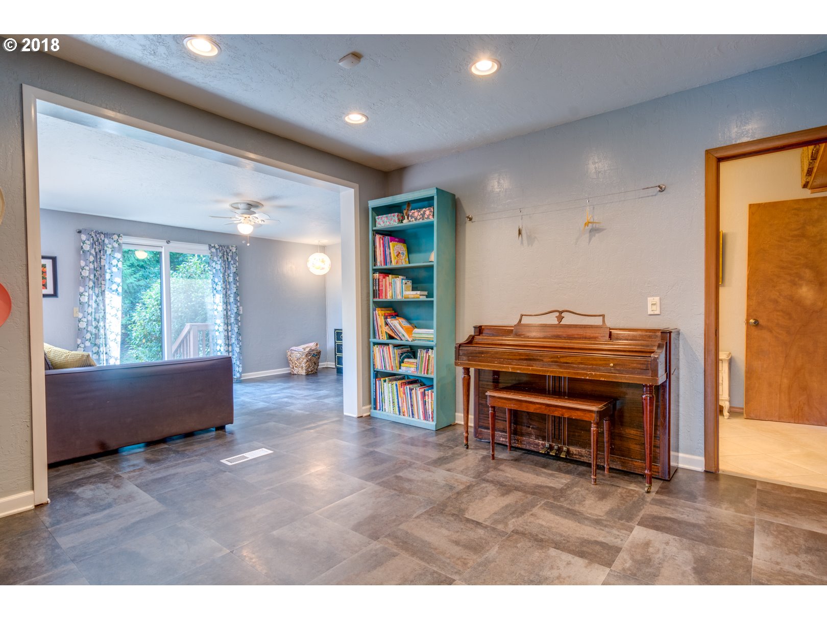 66794 Doetsch Road Deer Island, OR 97054 - Photo 13 of 32 a living room with furniture and a piano