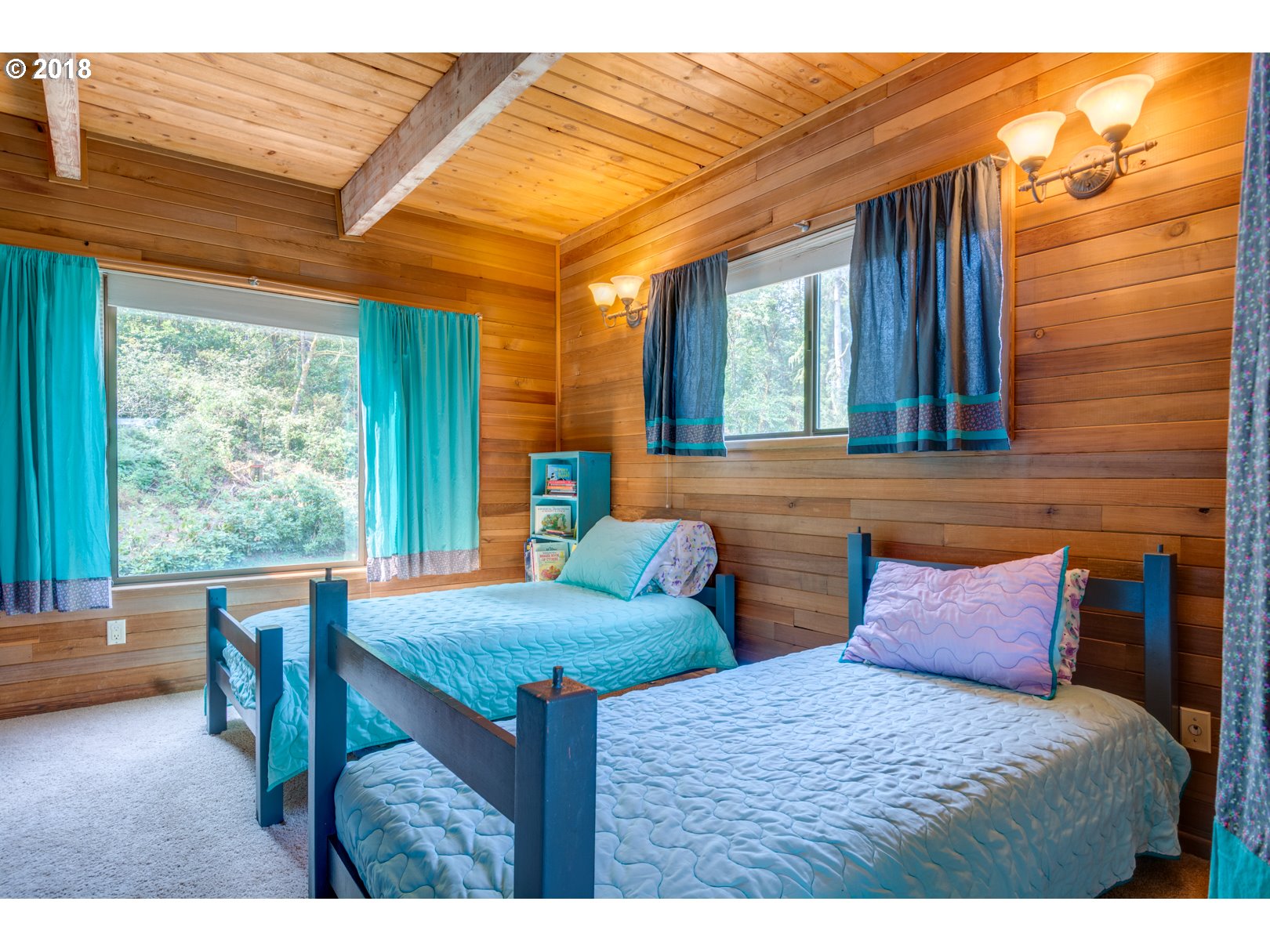 66794 Doetsch Road Deer Island, OR 97054 - Photo 20 of 32 a bedroom with a bed and large windows