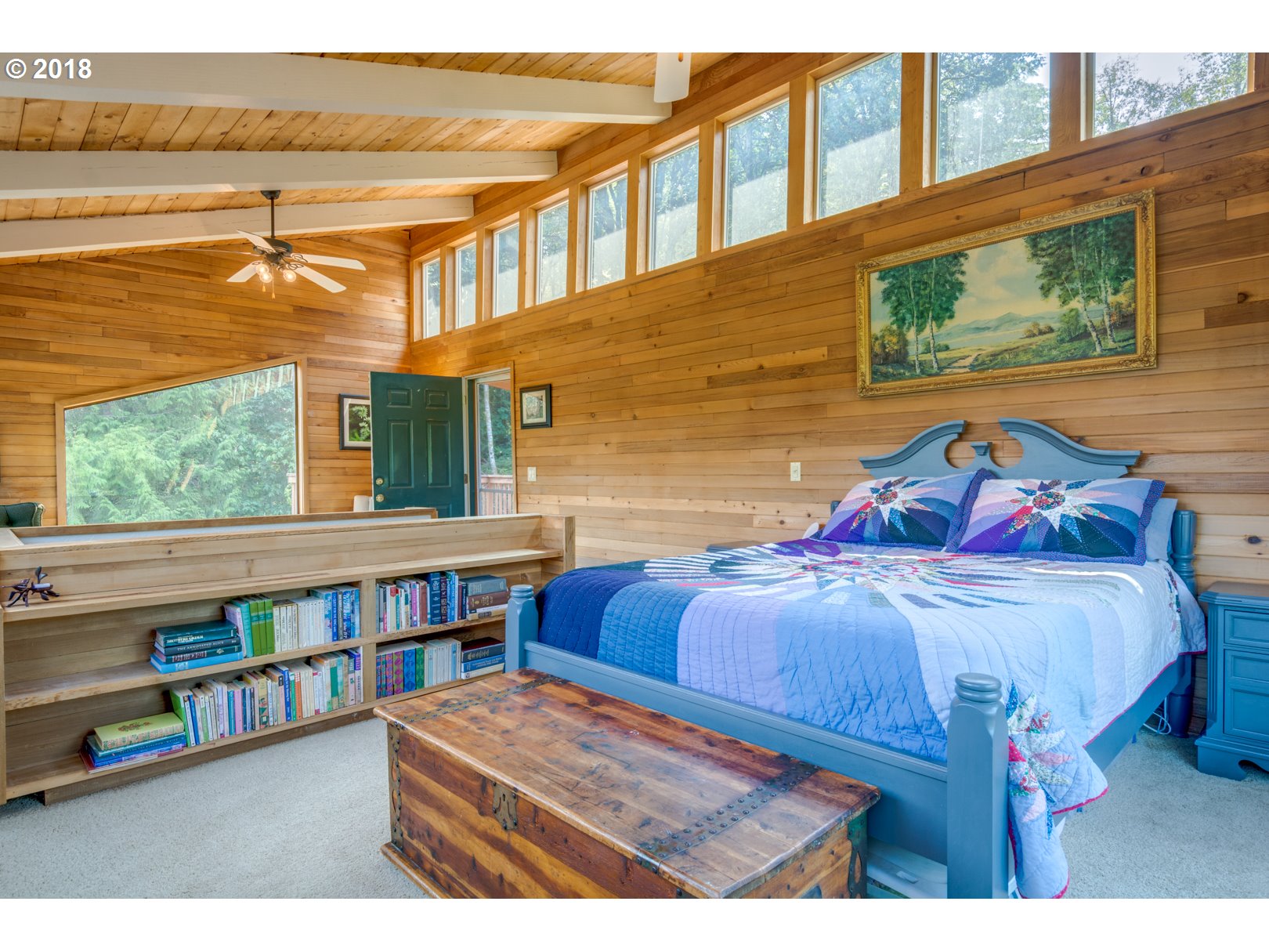 66794 Doetsch Road Deer Island, OR 97054 - Photo 22 of 32 a bedroom with a bed window and book shelf