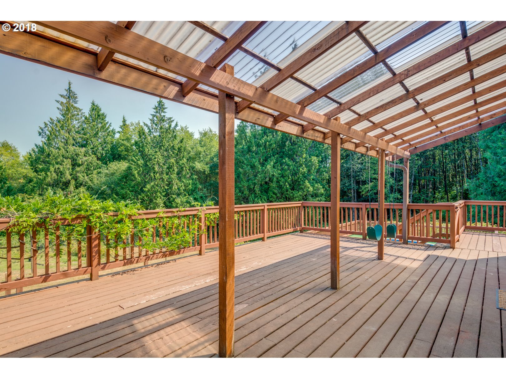 66794 Doetsch Road Deer Island, OR 97054 - Photo 24 of 32 a view of porch with wooden floor