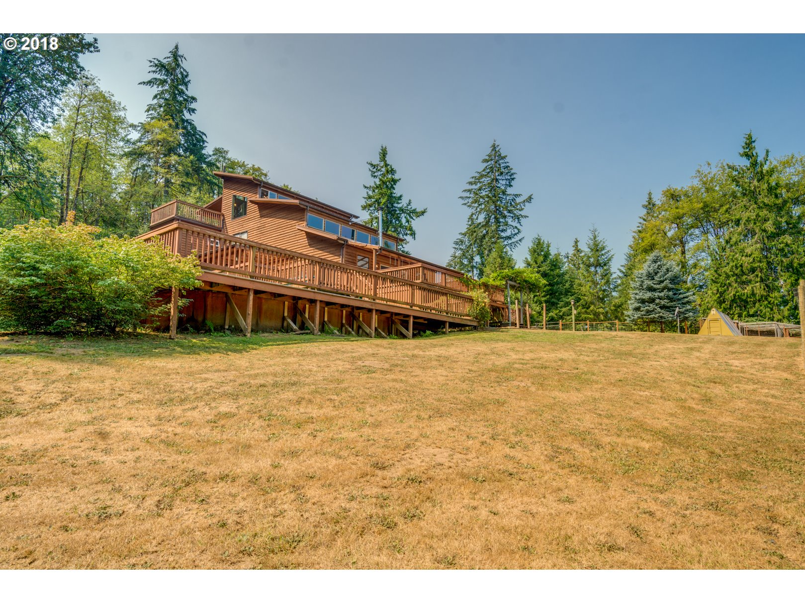 66794 Doetsch Road Deer Island, OR 97054 - Photo 26 of 32 a front view of a house with a yard