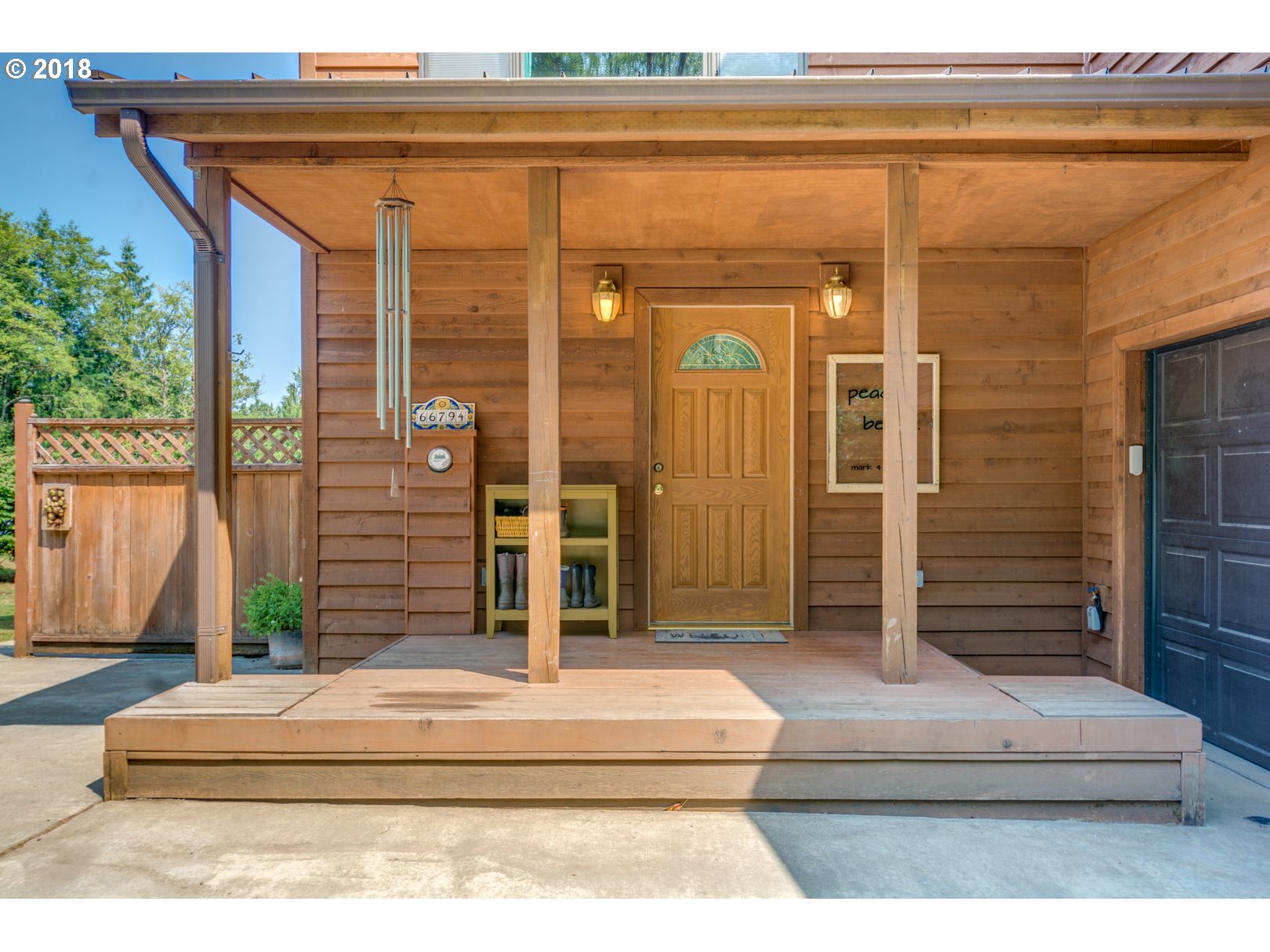 66794 Doetsch Road Deer Island, OR 97054 - Photo 3 of 32 a white building with a outdoor space