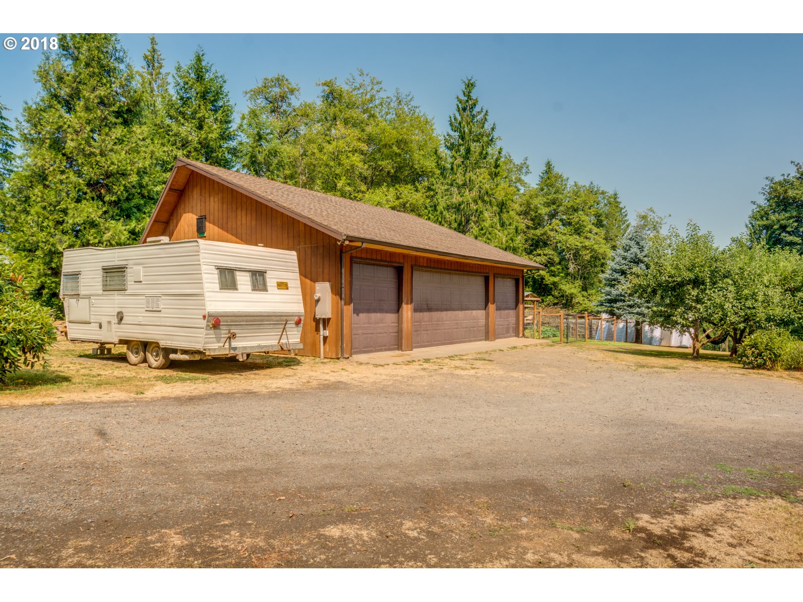 66794 Doetsch Road Deer Island, OR 97054 - Photo 31 of 32 a view of a house with a outdoor space