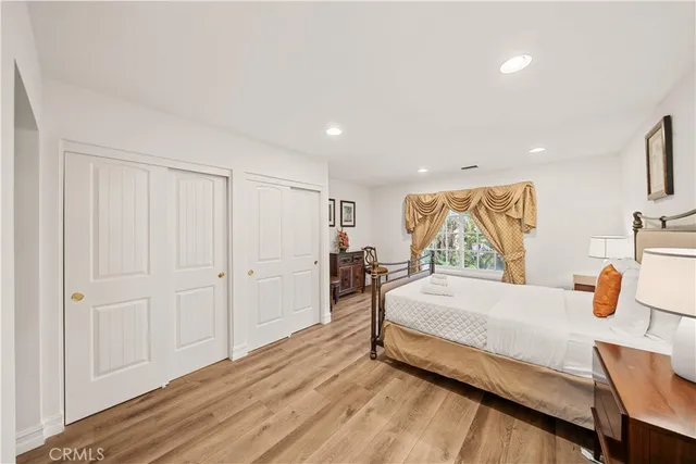 a swimming pool with outdoor seating and yard