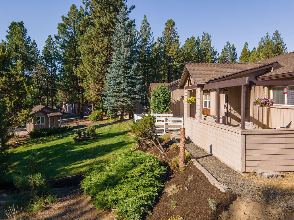 19132 Pumice Butte Road Bend, OR 97702 - Photo 33 of 49 front view of house with a garden