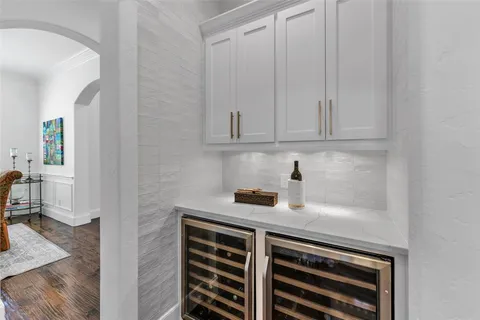 a kitchen with a cabinets and appliances