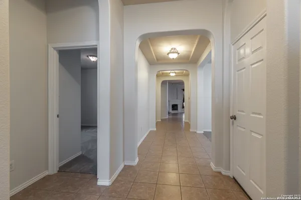 a view of a hallway to other door