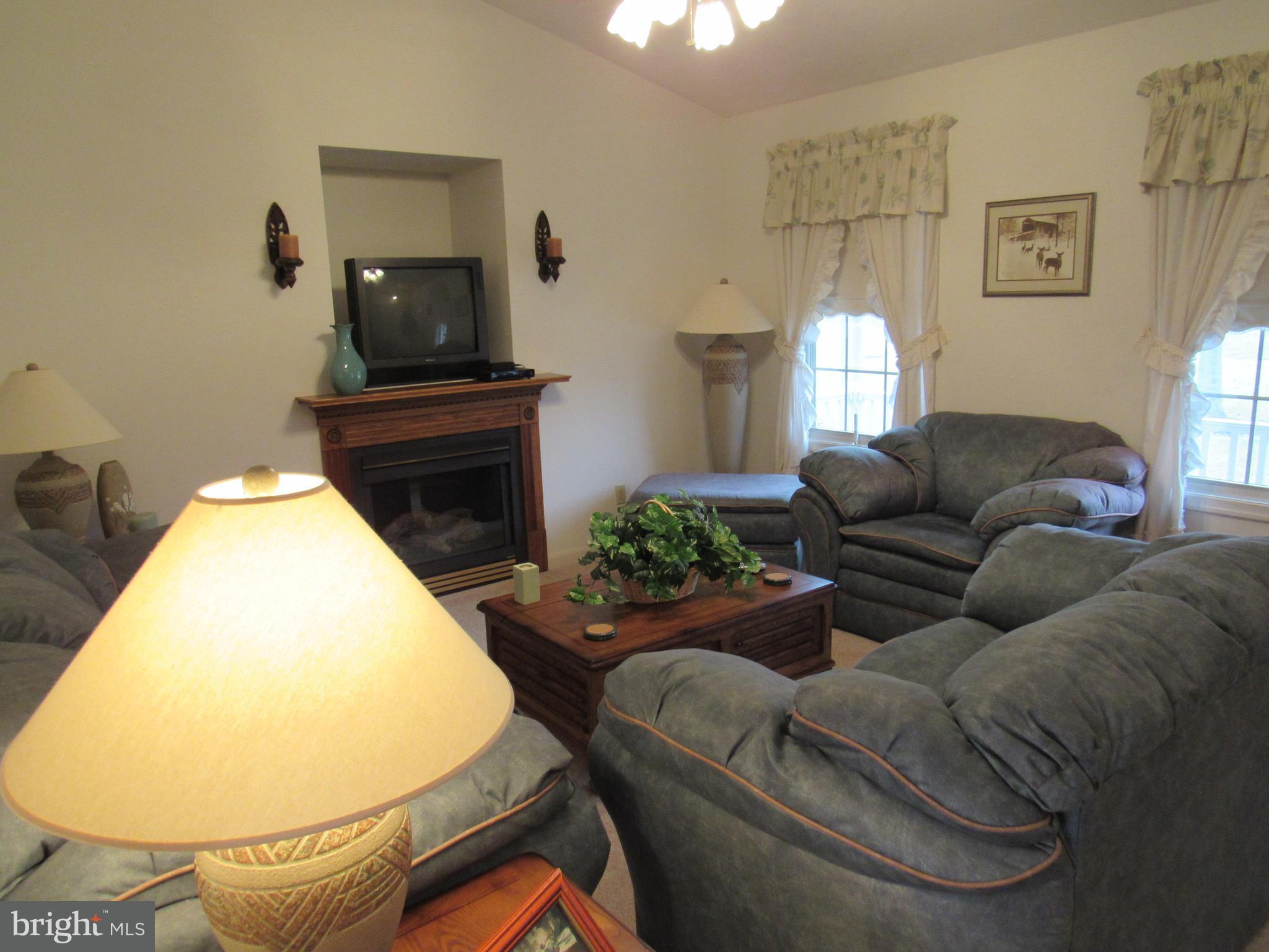 Living Room used about 5 times. Carpet like new.