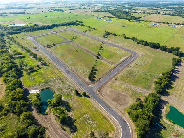 a view of a swimming pool with a lake view