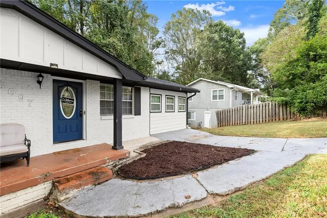 a house view with a outdoor space
