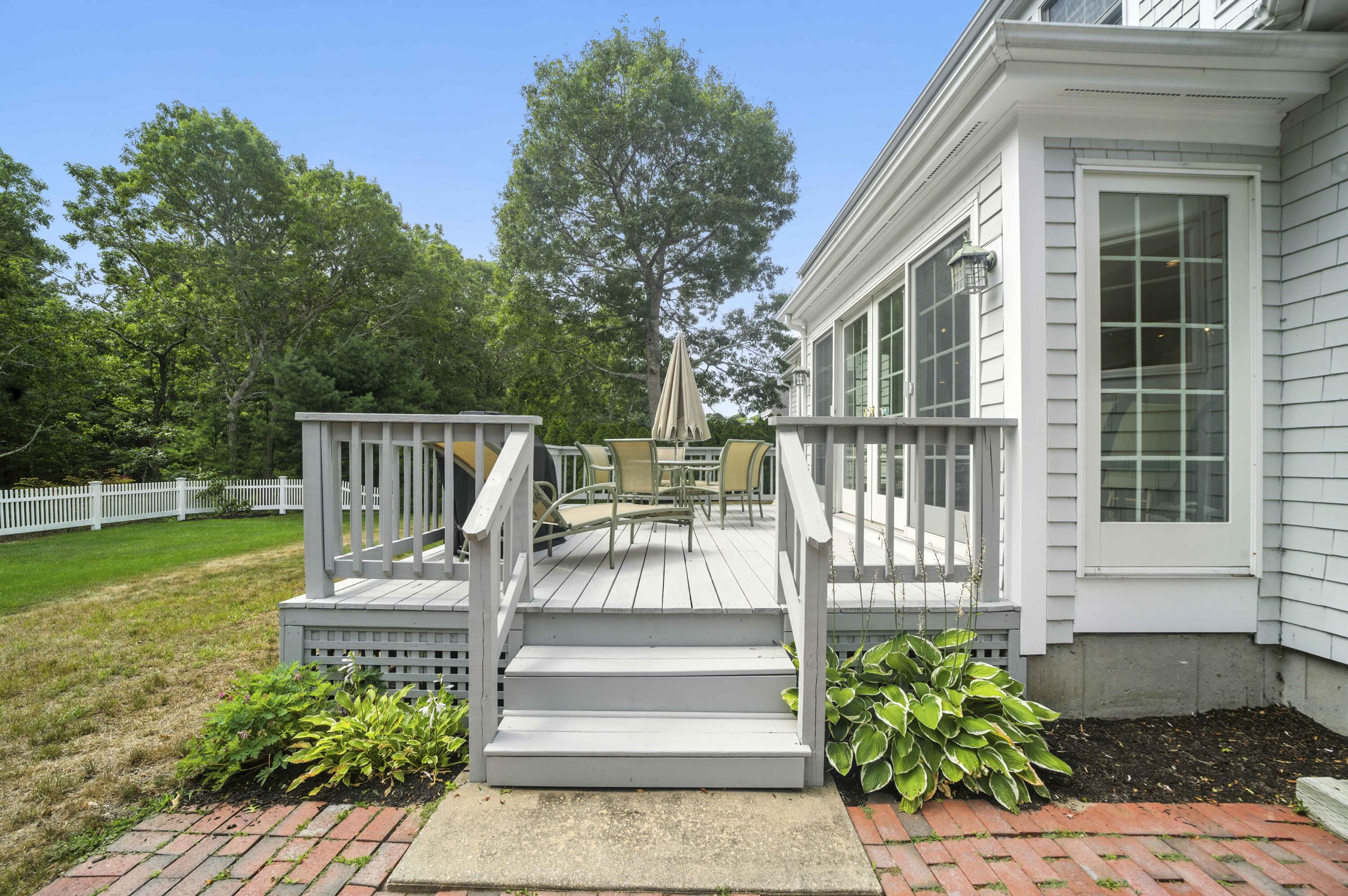 81 Falling Leaf Lane Osterville, MA 02655 - Photo 9 of 51 deck to patio