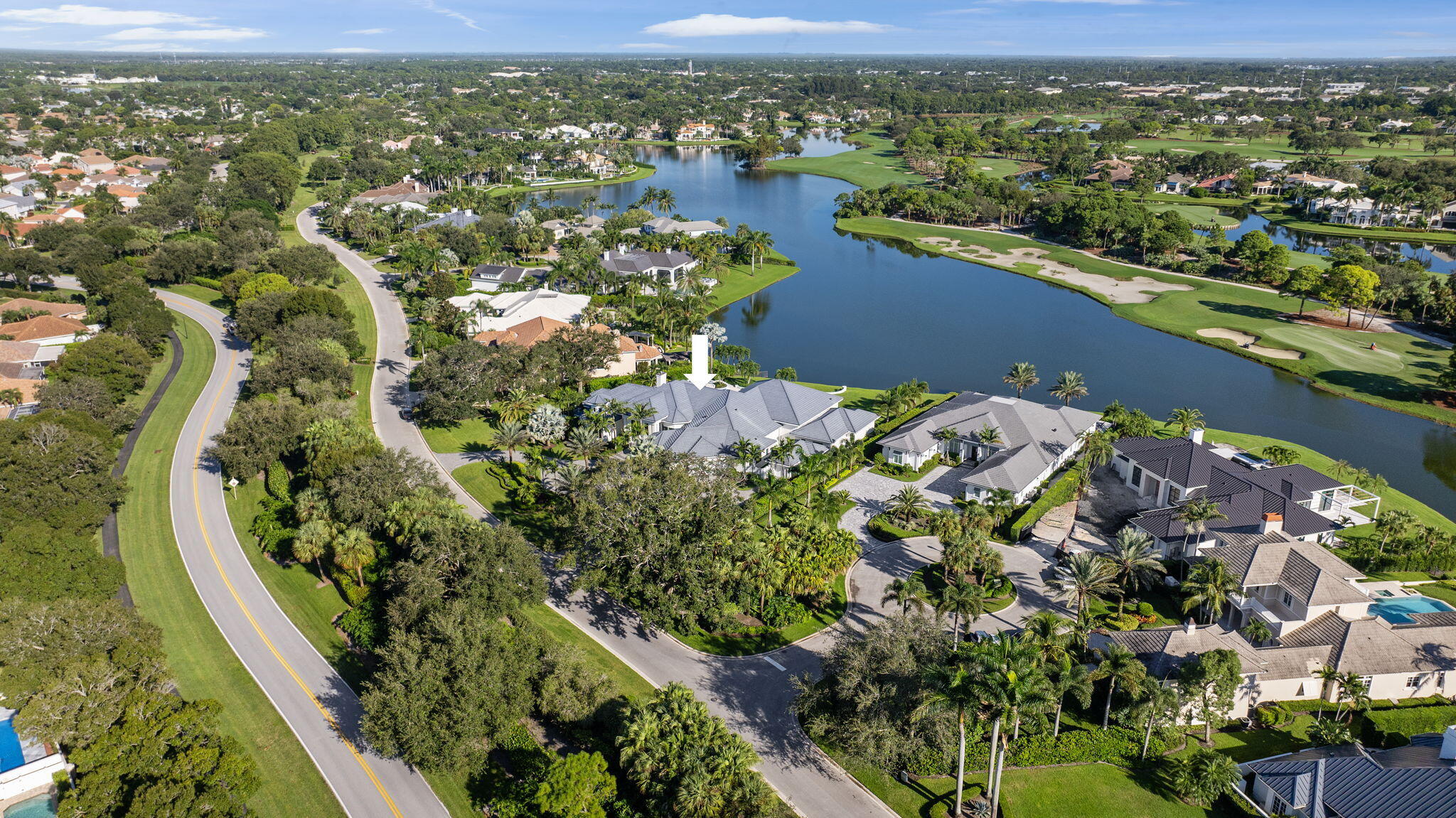 208 Locha Drive Jupiter, FL 33458 - Photo 107 of 125 an aerial view of residential houses with outdoor space and river